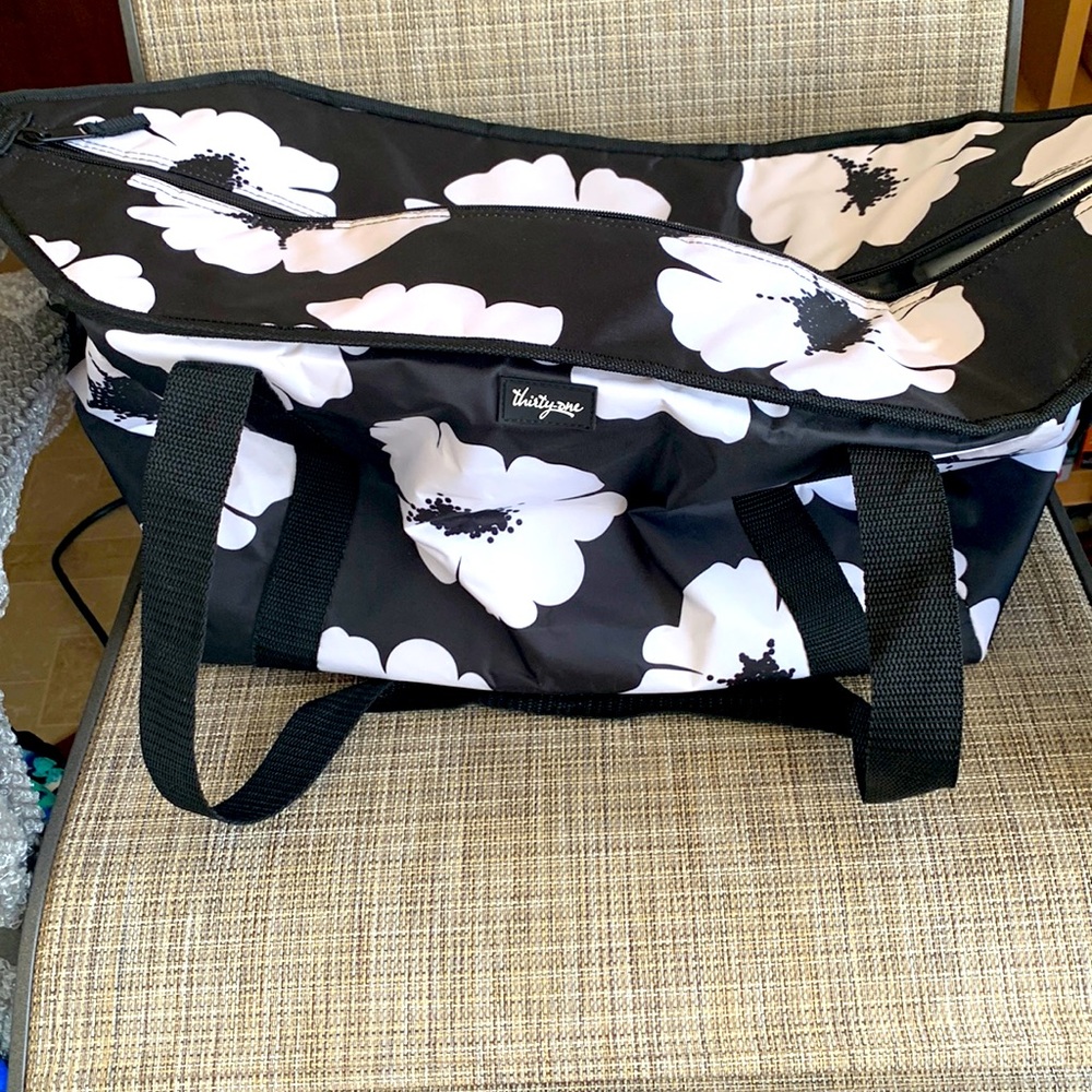 Brand new Thirty One Water Resistant Thermal bag with front pocket